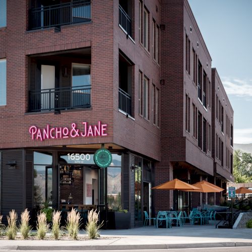 A brick building with a sign reading 